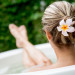 woman relaxing at home and taking a bath
